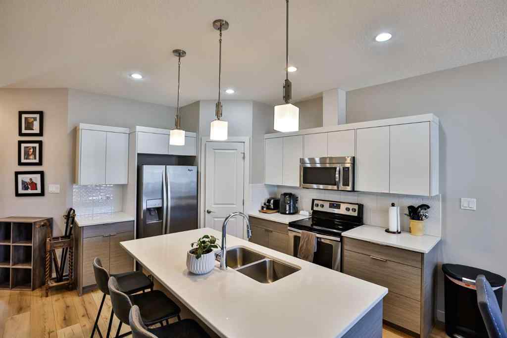 MLS® A2258936 - Unit #2 77 Aquitania Circle W in The Crossings Lethbridge, Residential