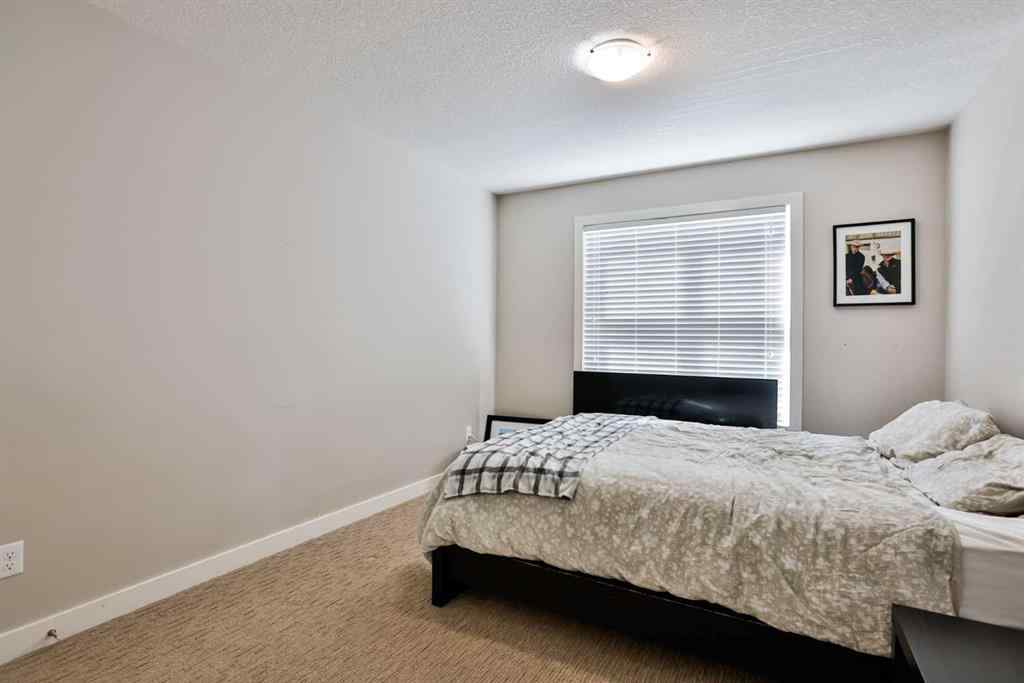 MLS® A2258936 - Unit #2 77 Aquitania Circle W in The Crossings Lethbridge, Residential