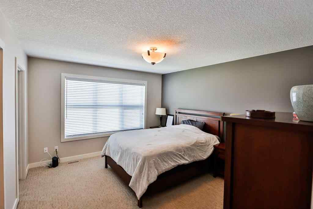 MLS® A2258936 - Unit #2 77 Aquitania Circle W in The Crossings Lethbridge, Residential