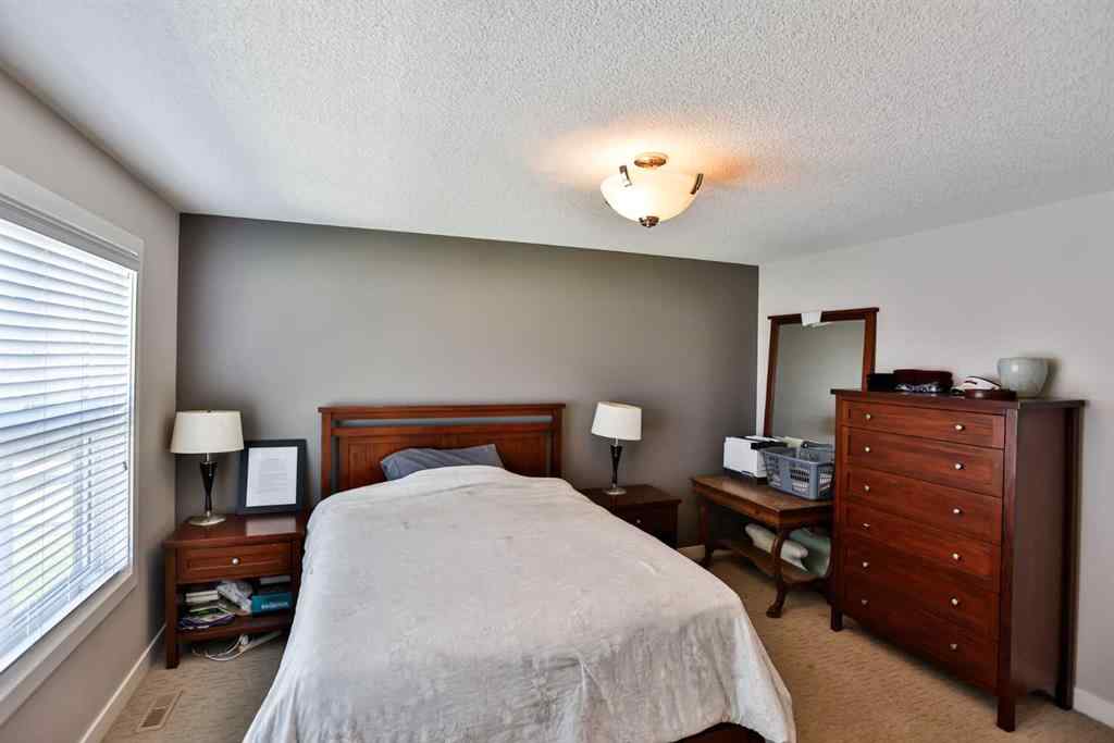 MLS® A2258936 - Unit #2 77 Aquitania Circle W in The Crossings Lethbridge, Residential