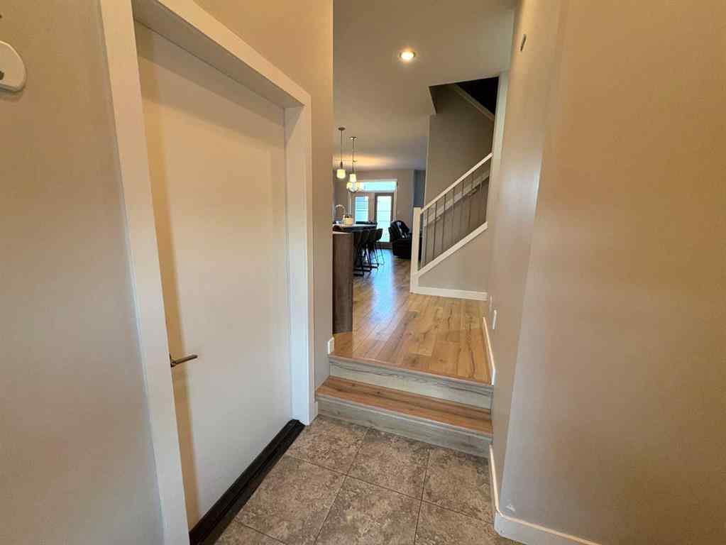 MLS® A2258936 - Unit #2 77 Aquitania Circle W in The Crossings Lethbridge, Residential