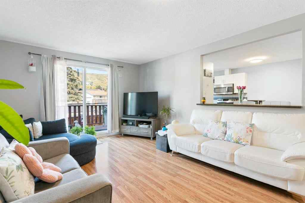 MLS® A2258955 - Unit #2 524 First Street E in East End Cochrane, Residential