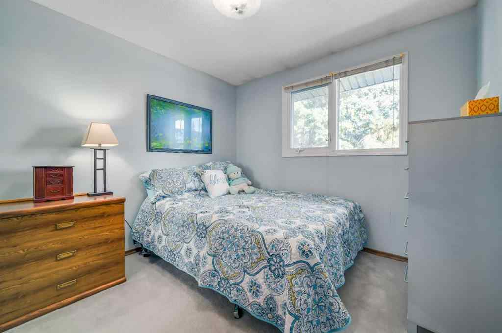 MLS® A2258963 - Unit #4 10910 Bonaventure Drive  in Willow Park Calgary, Residential