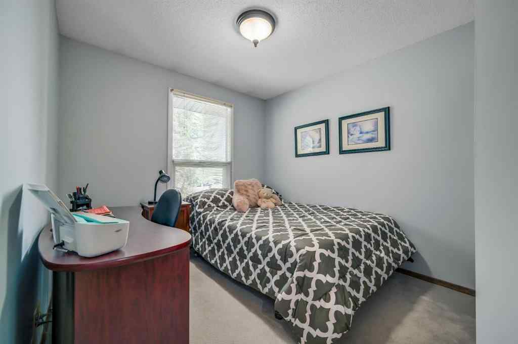 MLS® A2258963 - Unit #4 10910 Bonaventure Drive  in Willow Park Calgary, Residential