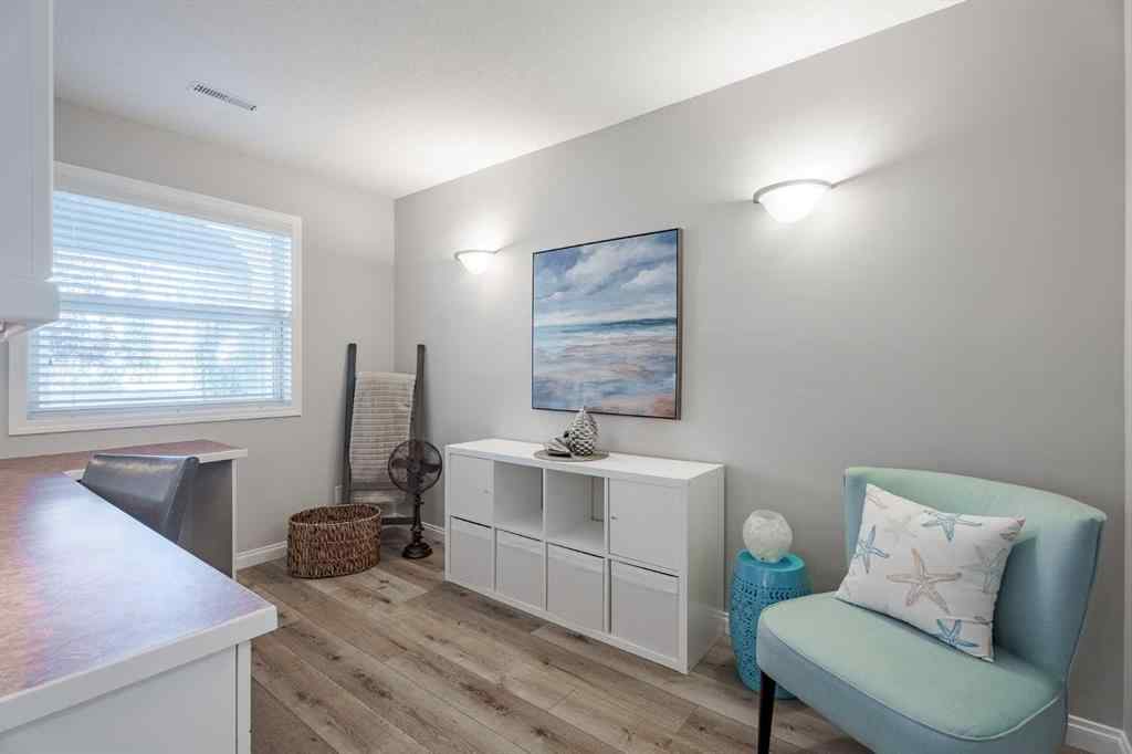 MLS® A2259009 - 100 Coopers Heights SW in Coopers Crossing Airdrie, Residential