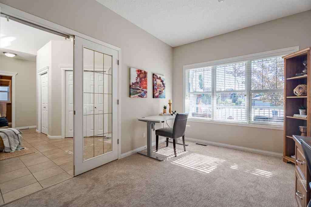 MLS® A2259009 - 100 Coopers Heights SW in Coopers Crossing Airdrie, Residential