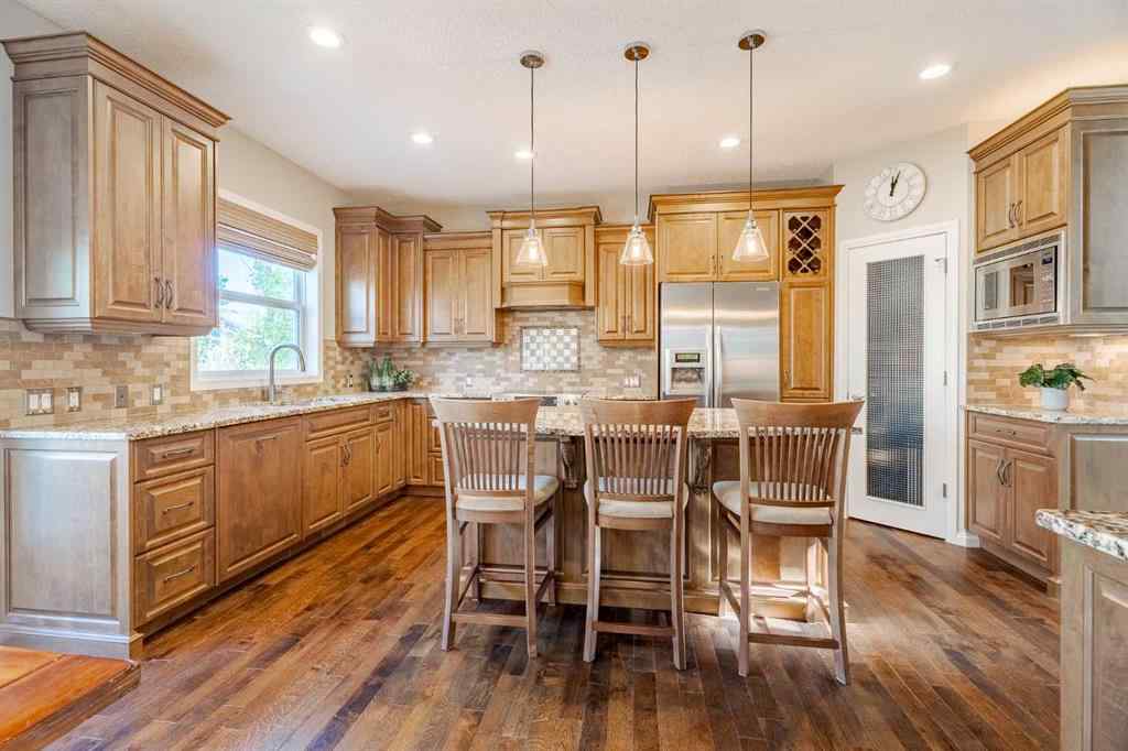 MLS® A2259009 - 100 Coopers Heights SW in Coopers Crossing Airdrie, Residential