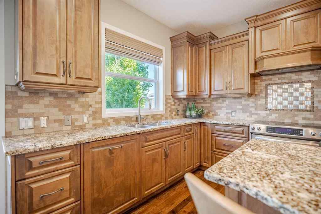 MLS® A2259009 - 100 Coopers Heights SW in Coopers Crossing Airdrie, Residential