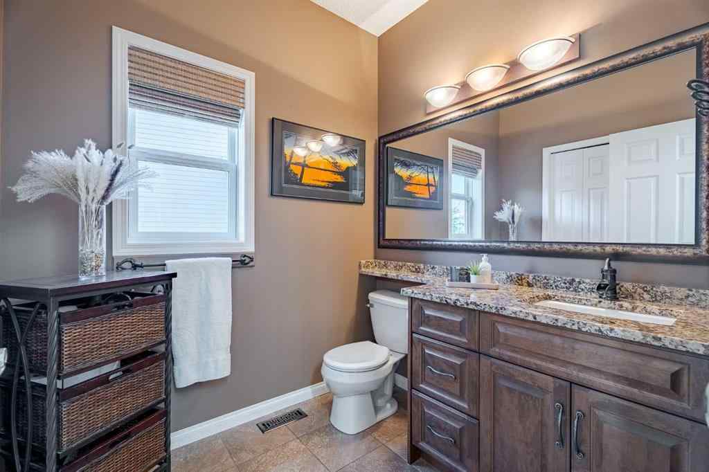 MLS® A2259009 - 100 Coopers Heights SW in Coopers Crossing Airdrie, Residential