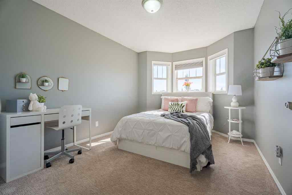 MLS® A2259009 - 100 Coopers Heights SW in Coopers Crossing Airdrie, Residential