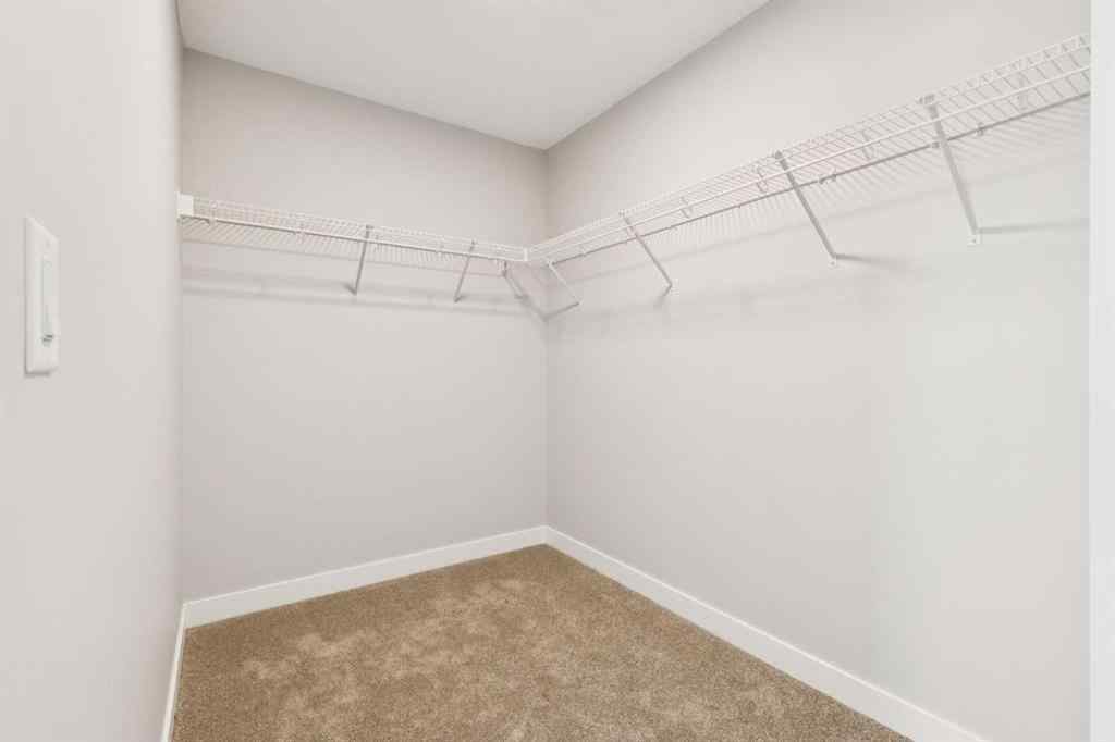 MLS® A2259027 - 215 Greenwich Drive NW in Greenwood/Greenbriar Calgary, Residential