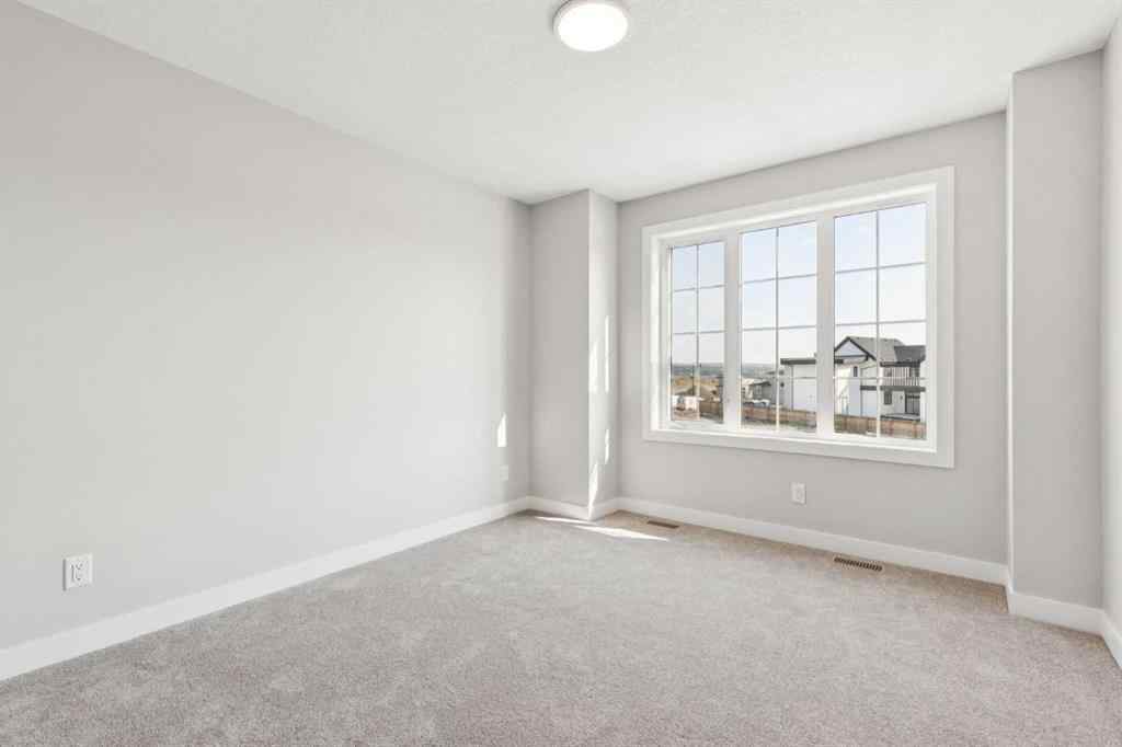 MLS® A2259027 - 215 Greenwich Drive NW in Greenwood/Greenbriar Calgary, Residential