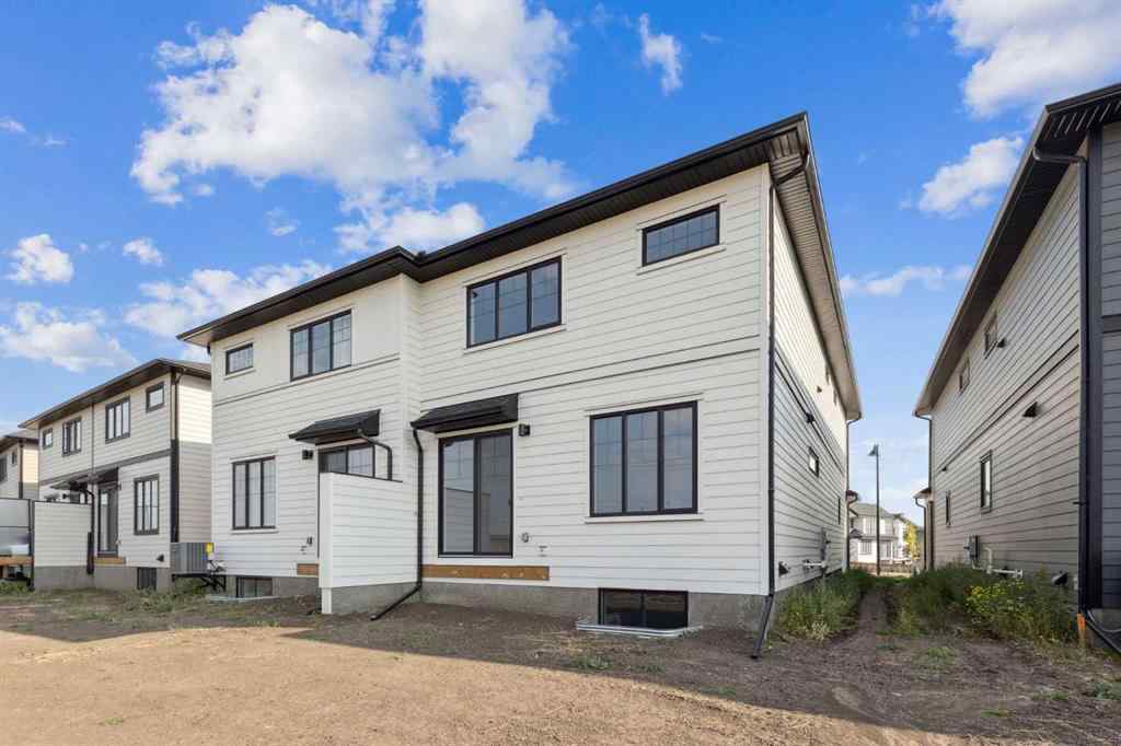 MLS® A2259027 - 215 Greenwich Drive NW in Greenwood/Greenbriar Calgary, Residential