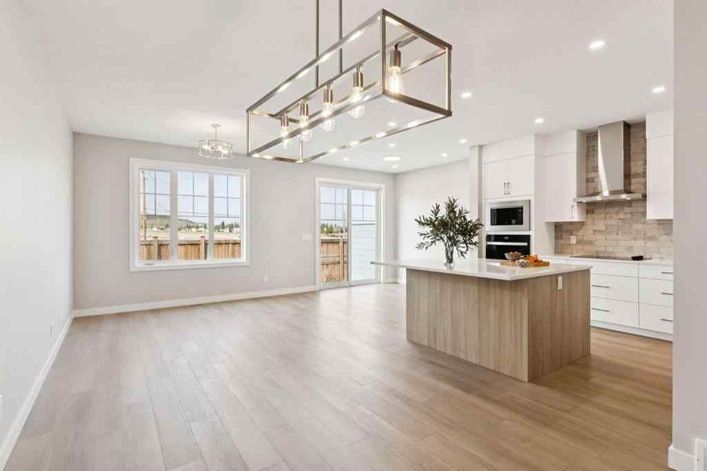 MLS® A2259027 - 215 Greenwich Drive NW in Greenwood/Greenbriar Calgary, Residential