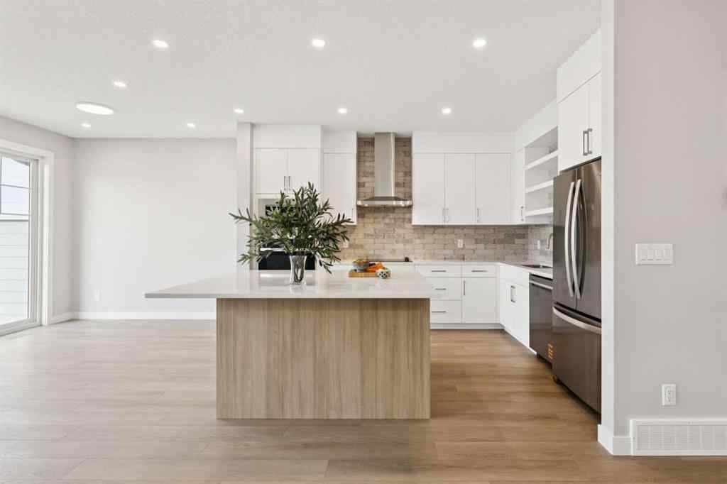 MLS® A2259027 - 215 Greenwich Drive NW in Greenwood/Greenbriar Calgary, Residential