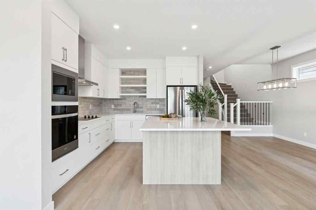 MLS® A2259027 - 215 Greenwich Drive NW in Greenwood/Greenbriar Calgary, Residential