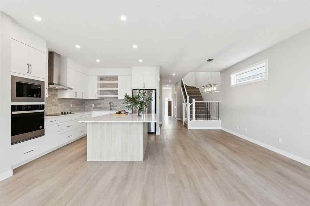 MLS® A2259027 - 215 Greenwich Drive NW in Greenwood/Greenbriar Calgary, Residential