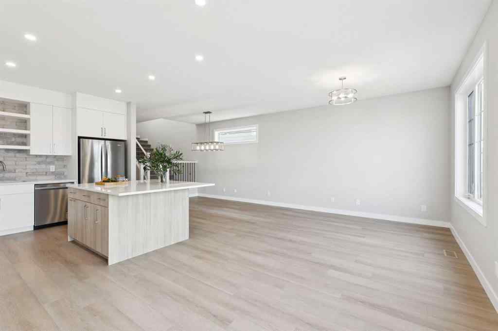 MLS® A2259027 - 215 Greenwich Drive NW in Greenwood/Greenbriar Calgary, Residential