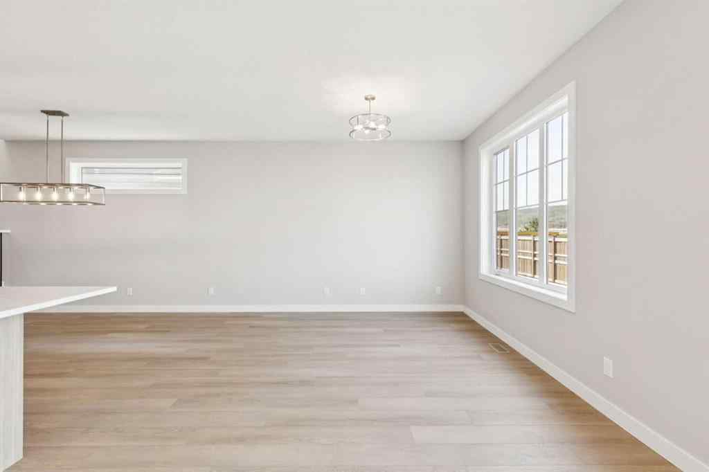 MLS® A2259027 - 215 Greenwich Drive NW in Greenwood/Greenbriar Calgary, Residential