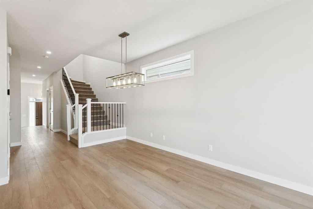 MLS® A2259027 - 215 Greenwich Drive NW in Greenwood/Greenbriar Calgary, Residential