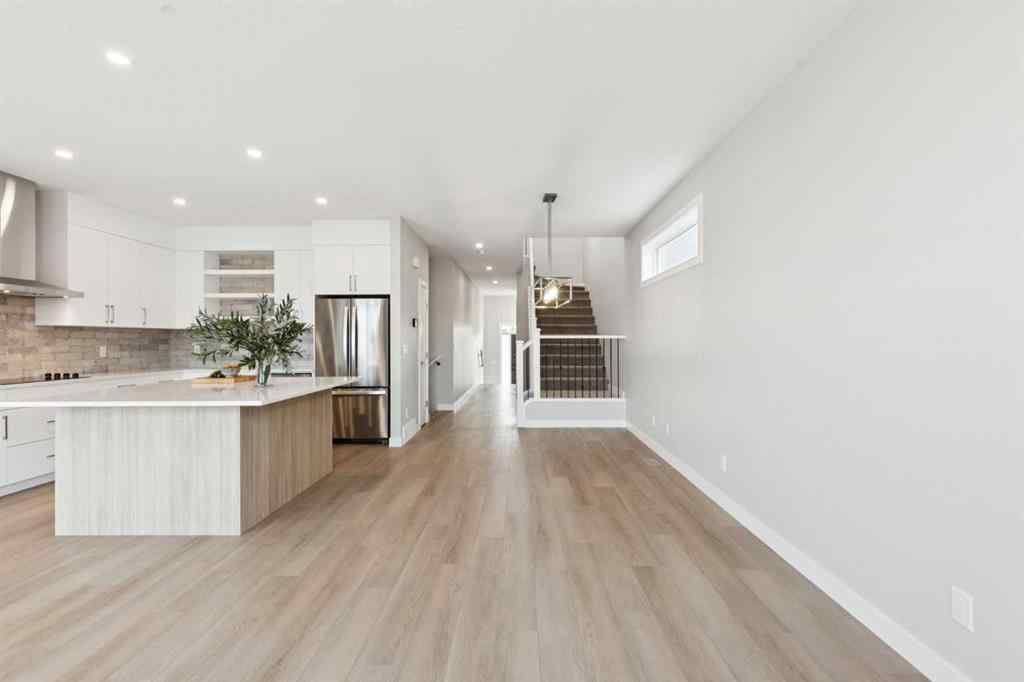 MLS® A2259027 - 215 Greenwich Drive NW in Greenwood/Greenbriar Calgary, Residential