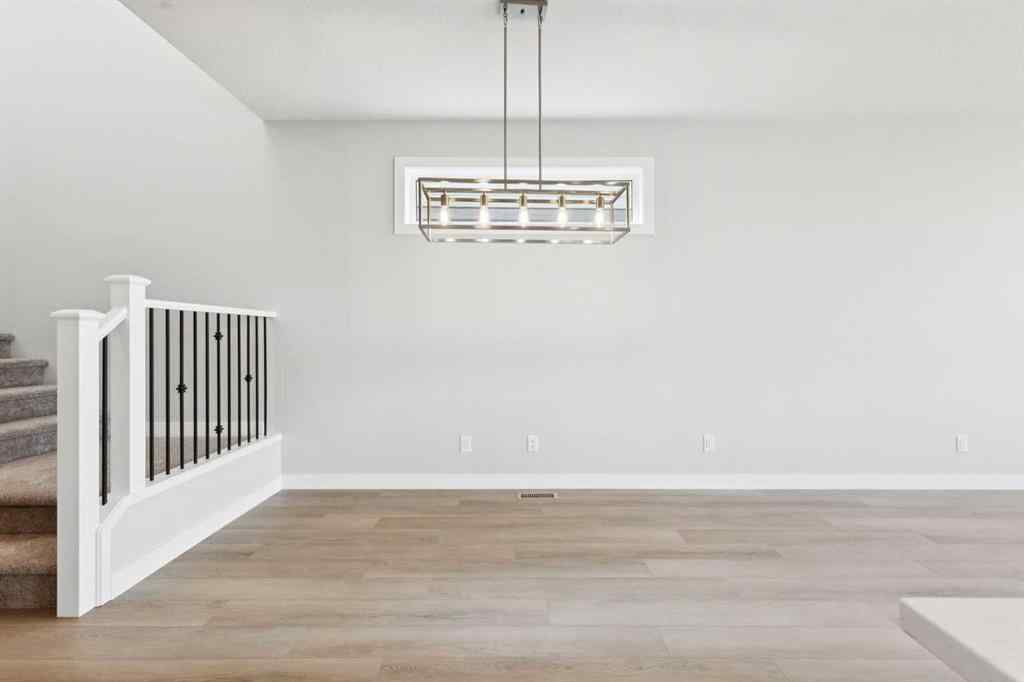 MLS® A2259027 - 215 Greenwich Drive NW in Greenwood/Greenbriar Calgary, Residential