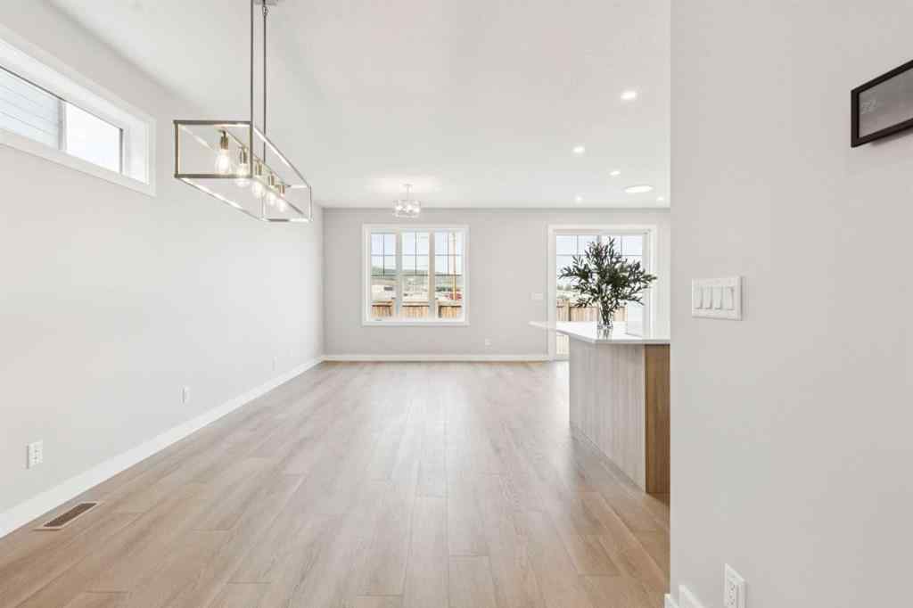 MLS® A2259027 - 215 Greenwich Drive NW in Greenwood/Greenbriar Calgary, Residential