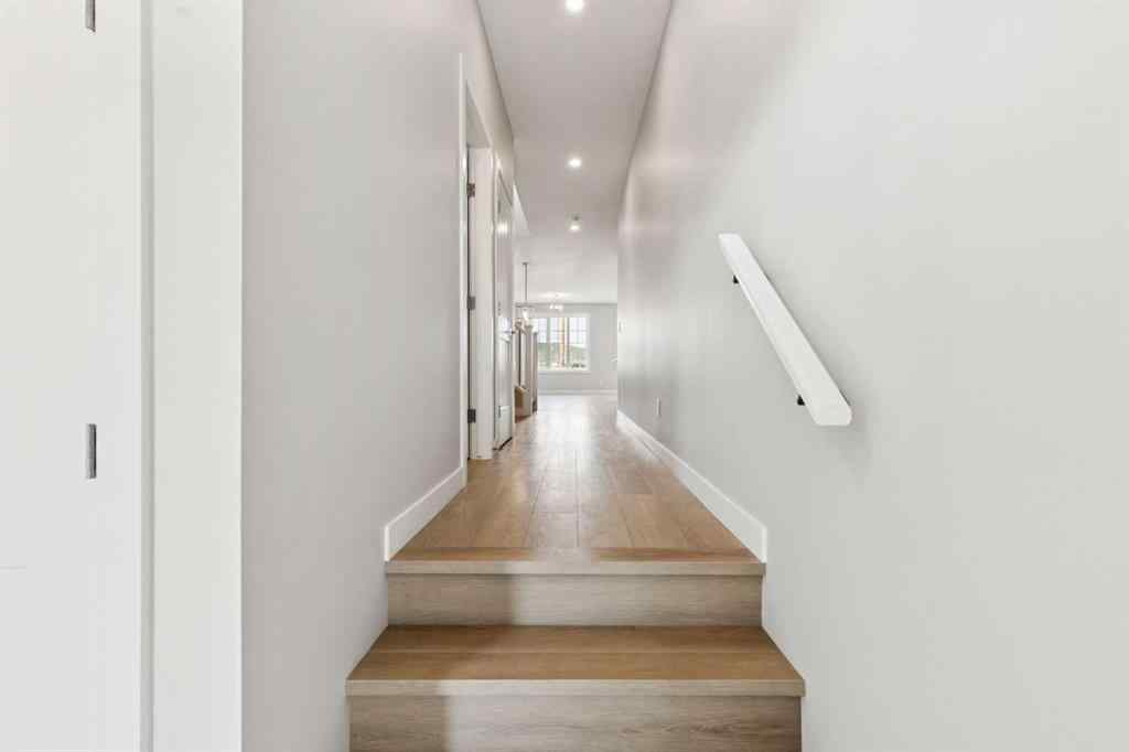 MLS® A2259027 - 215 Greenwich Drive NW in Greenwood/Greenbriar Calgary, Residential