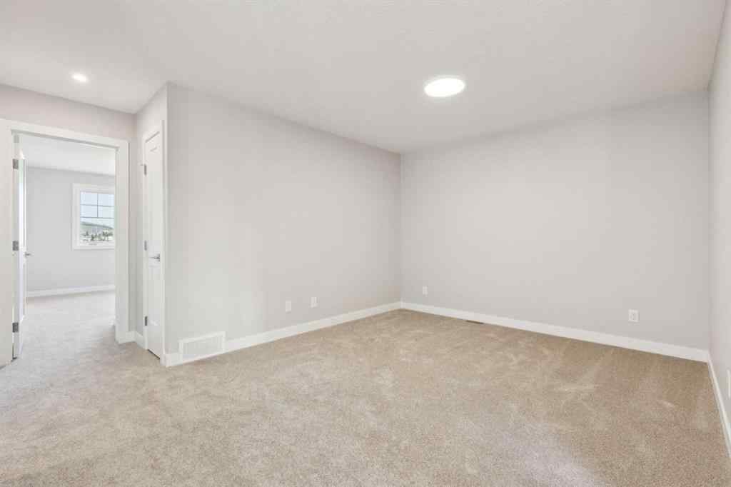 MLS® A2259027 - 215 Greenwich Drive NW in Greenwood/Greenbriar Calgary, Residential