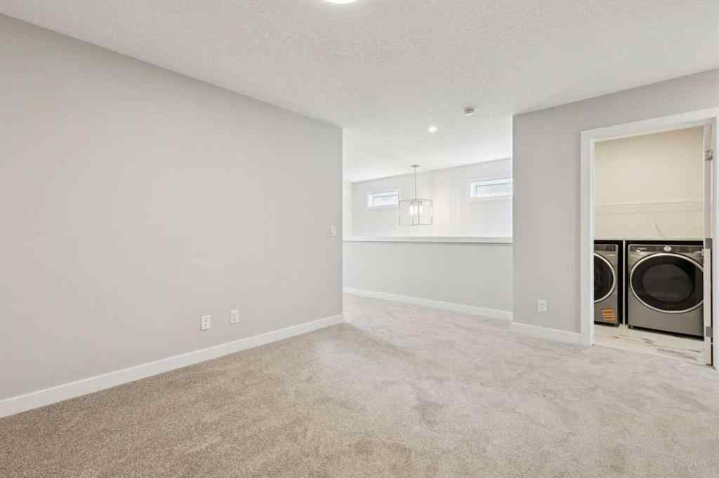 MLS® A2259027 - 215 Greenwich Drive NW in Greenwood/Greenbriar Calgary, Residential