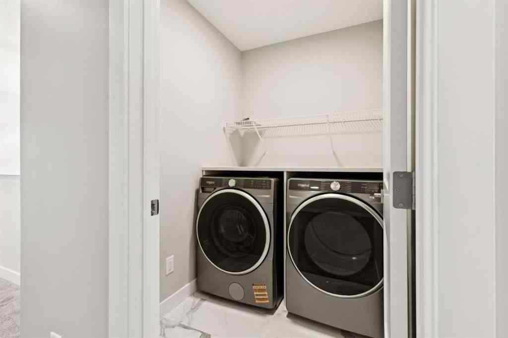 MLS® A2259027 - 215 Greenwich Drive NW in Greenwood/Greenbriar Calgary, Residential