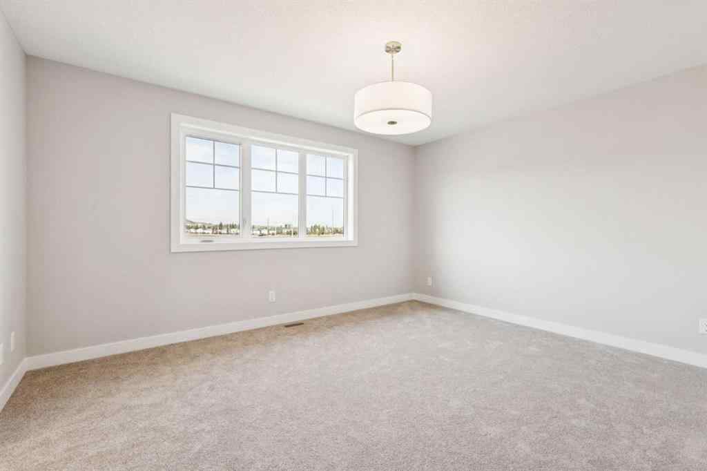 MLS® A2259027 - 215 Greenwich Drive NW in Greenwood/Greenbriar Calgary, Residential