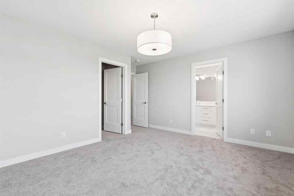 MLS® A2259027 - 215 Greenwich Drive NW in Greenwood/Greenbriar Calgary, Residential