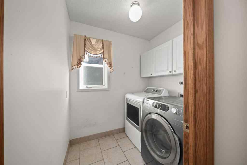 MLS® A2259058 - 24 Riverside Crescent SE in Riverbend Calgary, Residential