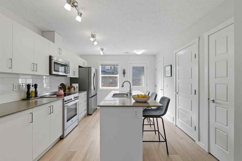 MLS® A2259079 - 253 Cranbrook Square SE in Cranston Calgary, Residential