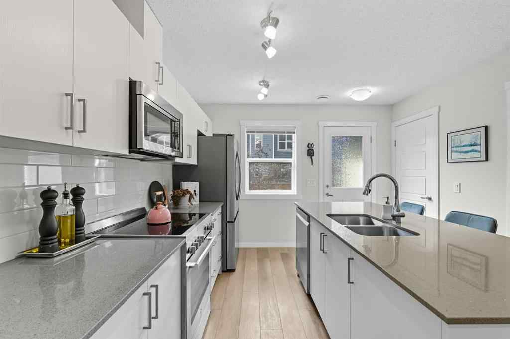 MLS® A2259079 - 253 Cranbrook Square SE in Cranston Calgary, Residential