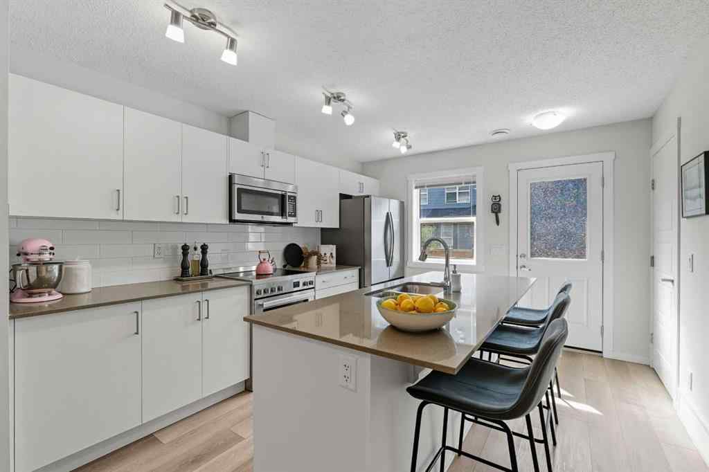 MLS® A2259079 - 253 Cranbrook Square SE in Cranston Calgary, Residential