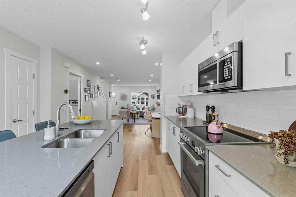 MLS® A2259079 - 253 Cranbrook Square SE in Cranston Calgary, Residential