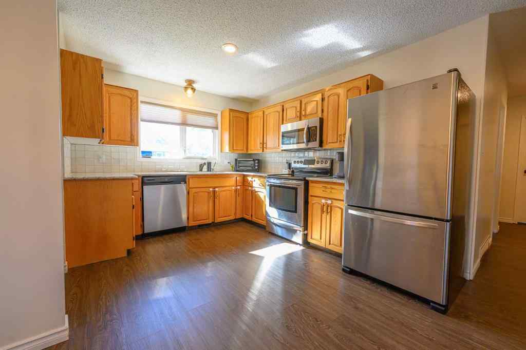MLS® A2259080 - 9513 77 Avenue  in Patterson Place Grande Prairie, Residential
