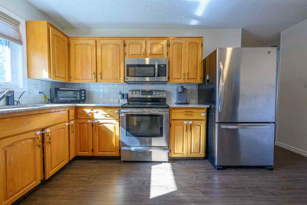 MLS® A2259080 - 9513 77 Avenue  in Patterson Place Grande Prairie, Residential