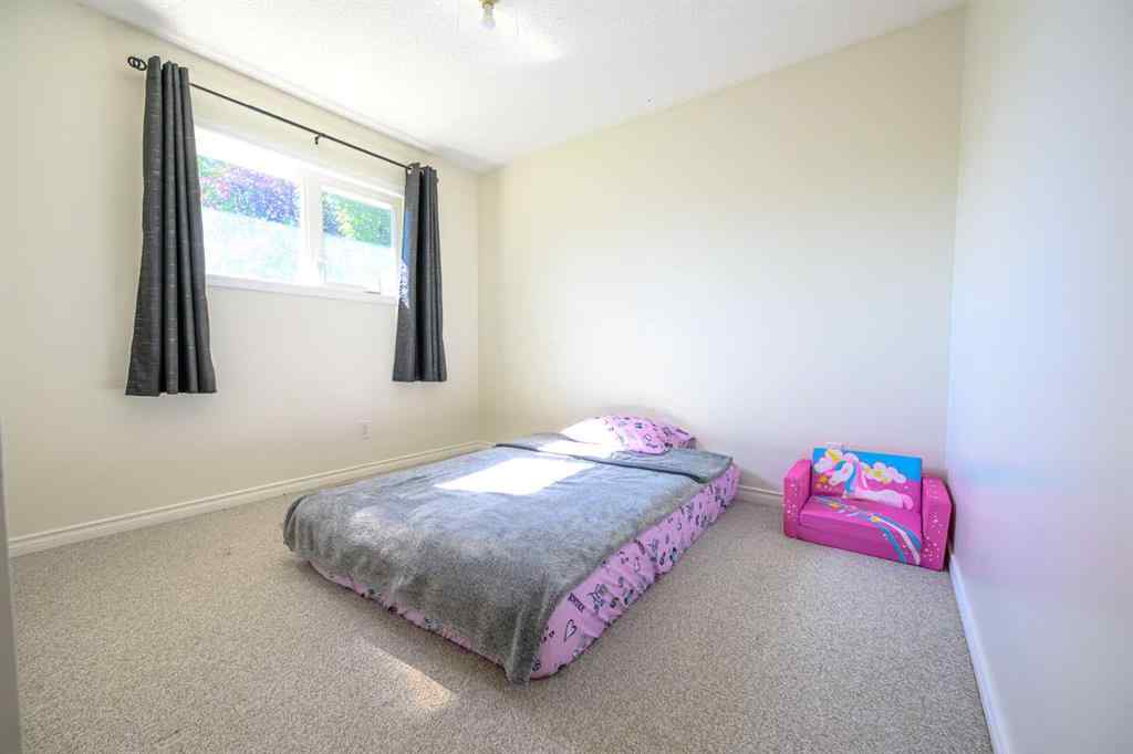 MLS® A2259080 - 9513 77 Avenue  in Patterson Place Grande Prairie, Residential