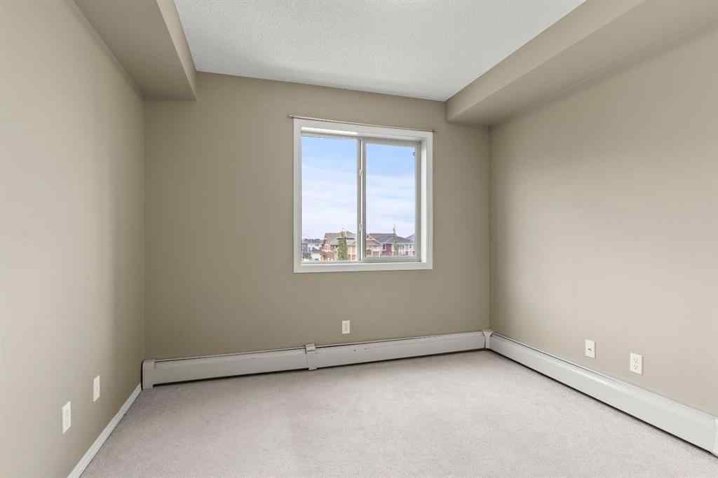 MLS® A2259124 - Unit #316 15 Saddlestone Way NE in Saddle Ridge Calgary, Residential
