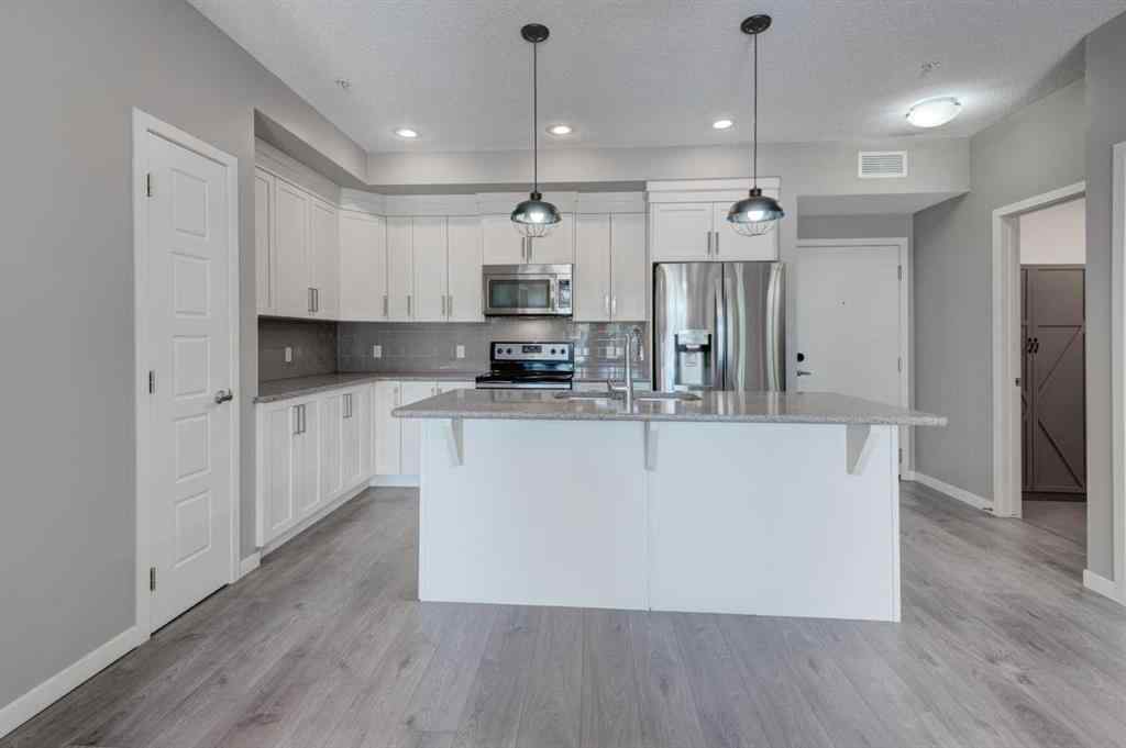 MLS® A2259138 - Unit #103 6703 New Brighton Avenue SE in New Brighton Calgary, Residential
