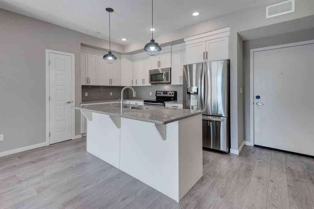 MLS® A2259138 - Unit #103 6703 New Brighton Avenue SE in New Brighton Calgary, Residential