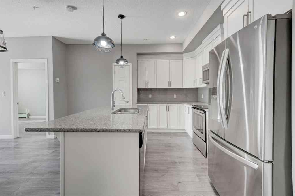 MLS® A2259138 - Unit #103 6703 New Brighton Avenue SE in New Brighton Calgary, Residential