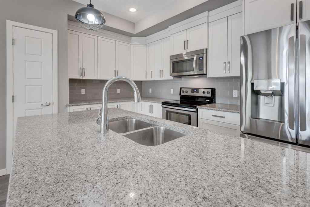 MLS® A2259138 - Unit #103 6703 New Brighton Avenue SE in New Brighton Calgary, Residential