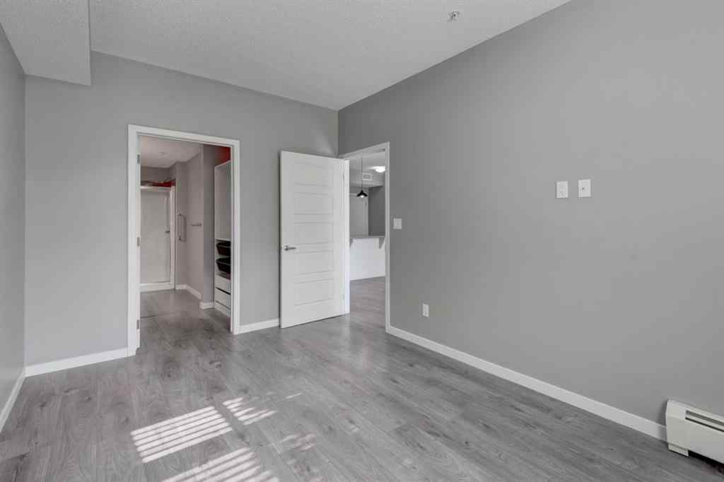 MLS® A2259138 - Unit #103 6703 New Brighton Avenue SE in New Brighton Calgary, Residential
