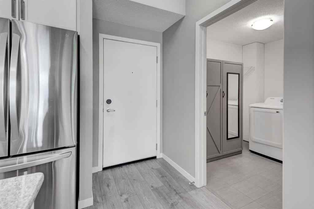 MLS® A2259138 - Unit #103 6703 New Brighton Avenue SE in New Brighton Calgary, Residential