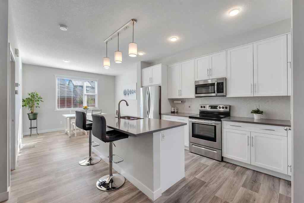 MLS® A2259148 - 404 Kingsmere Way SE in Kings Heights Airdrie, Residential