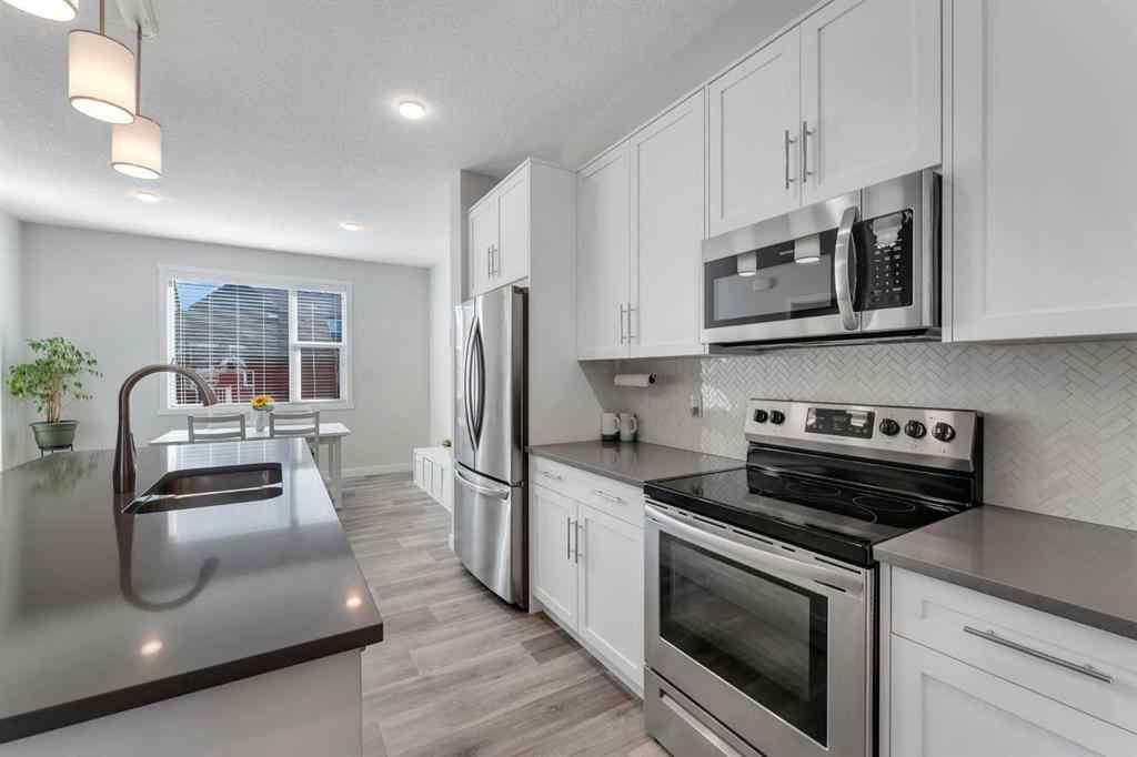 MLS® A2259148 - 404 Kingsmere Way SE in Kings Heights Airdrie, Residential